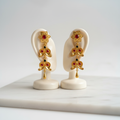 Gold & Red Stone Earrings on Ear Display Stand