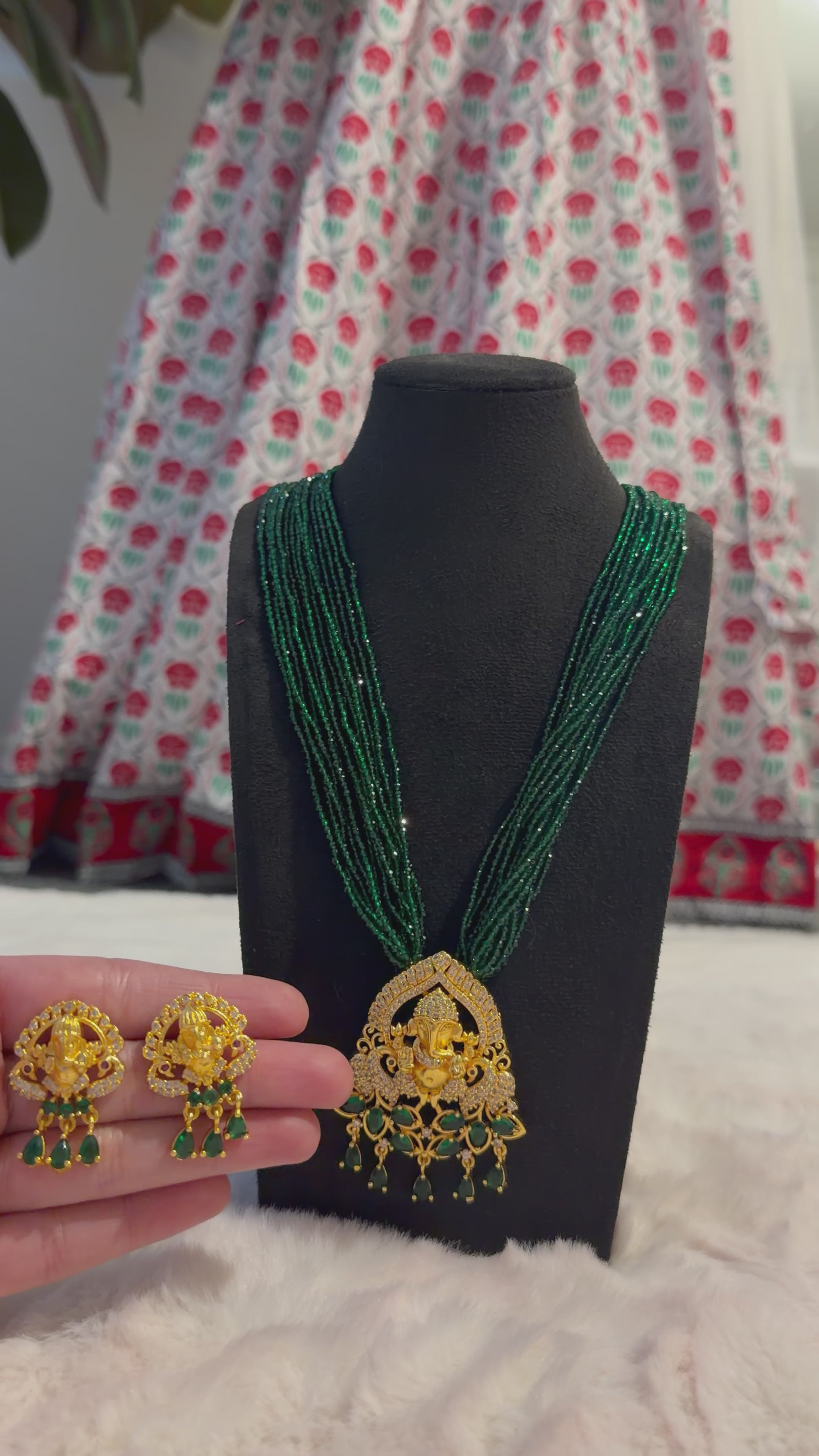 HYDRO CRYSTAL POTE WITH AMERICAN DIAMOND PENDENT GANESH